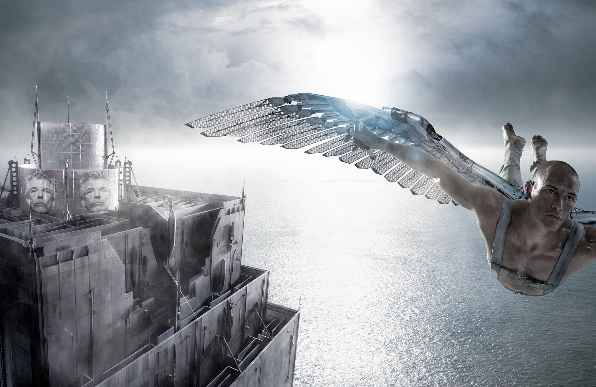 Photographic composite — a winged figure with articulated metal wings soars away from a towering industrial structure, out over a vast silver sea and overcast sky.